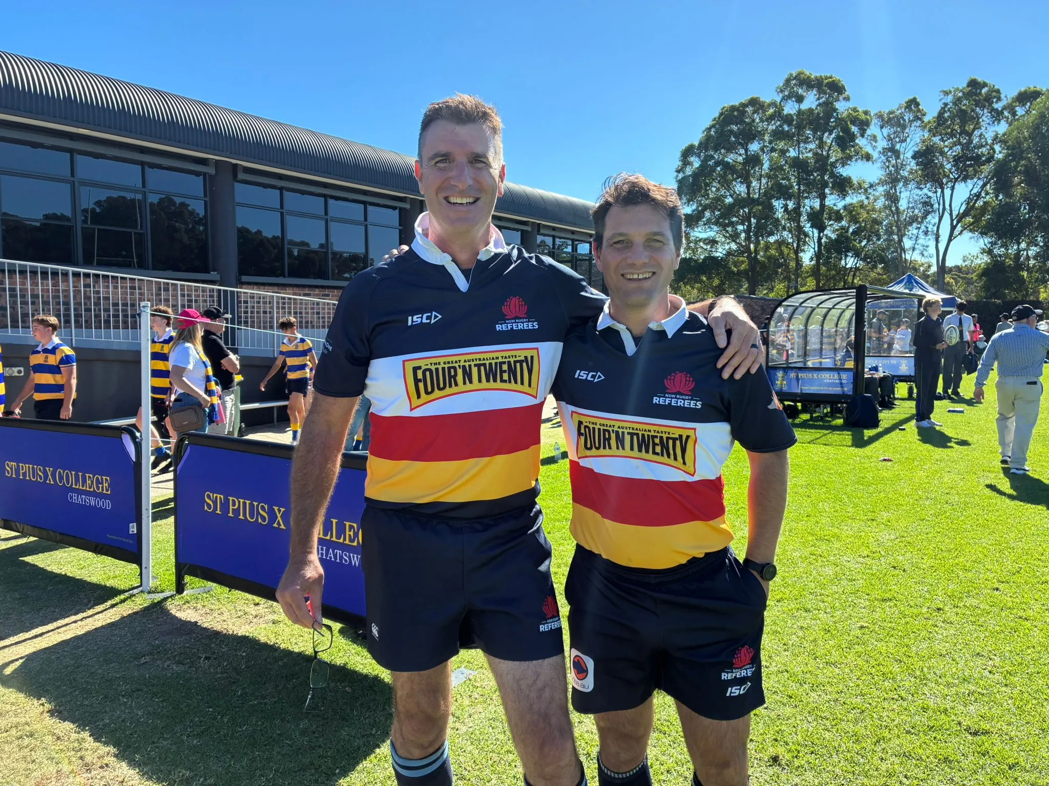 Two referees before a schools match